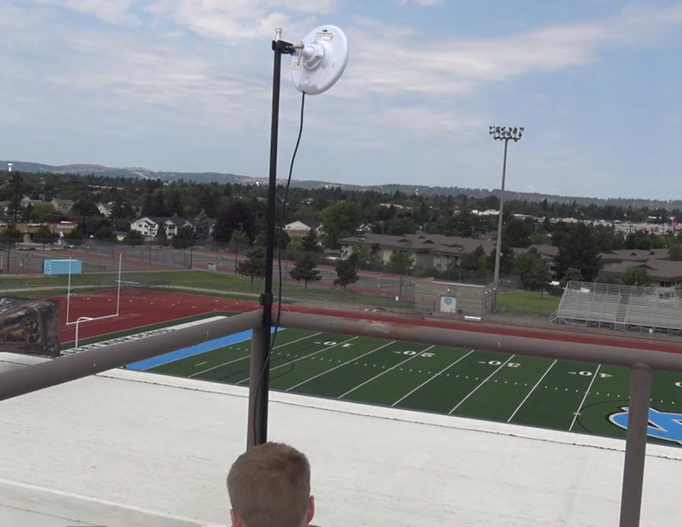 pressbox bridge tether tripod to fence on top of press box.png